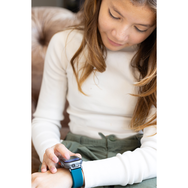 Girl looking at watch